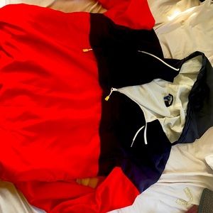 Navy blue and red windbreaker